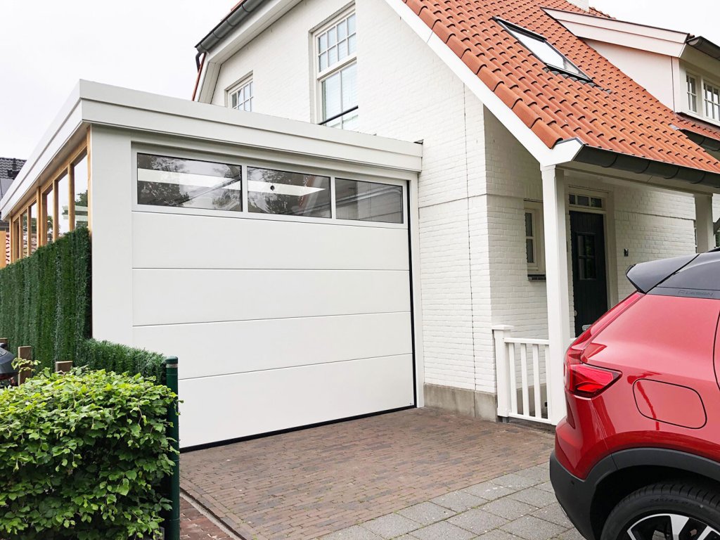 Reparatie van rolluiken, garagedeuren en zonwering.